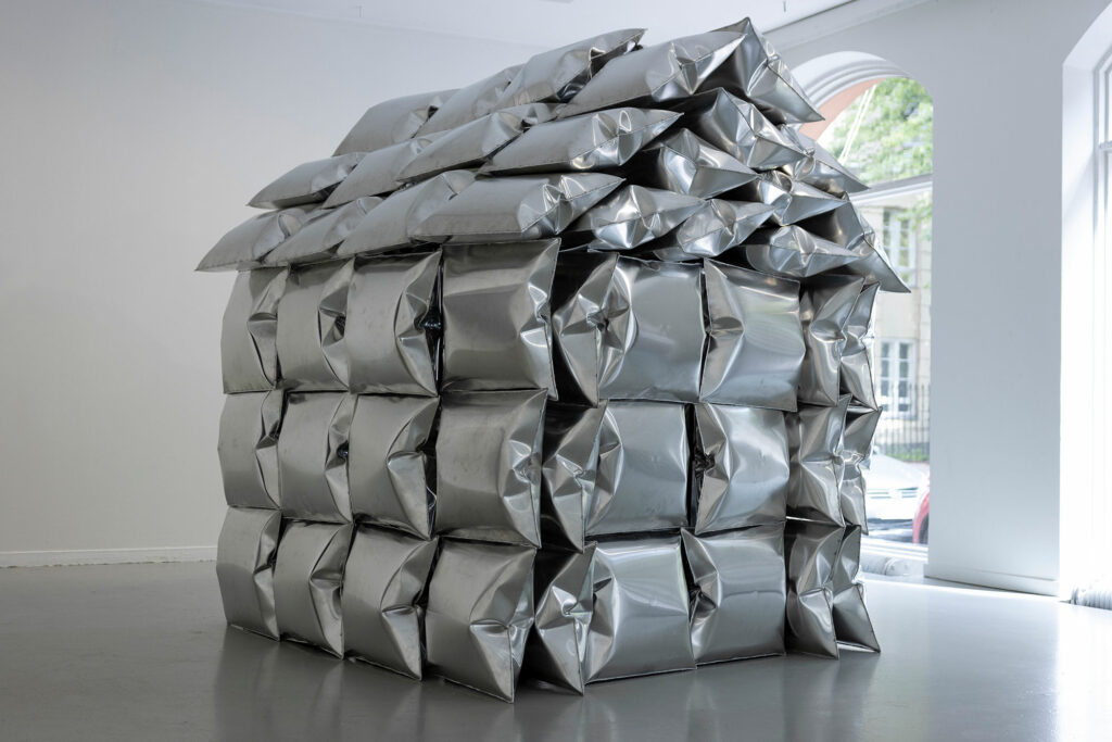 A house made of metal pillows.